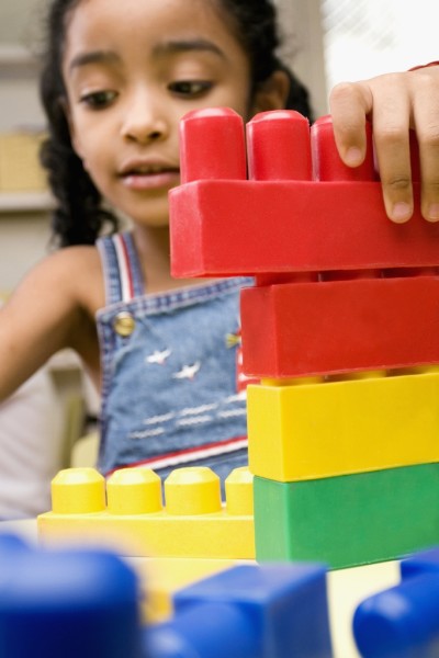 Preschooler playing with blocks